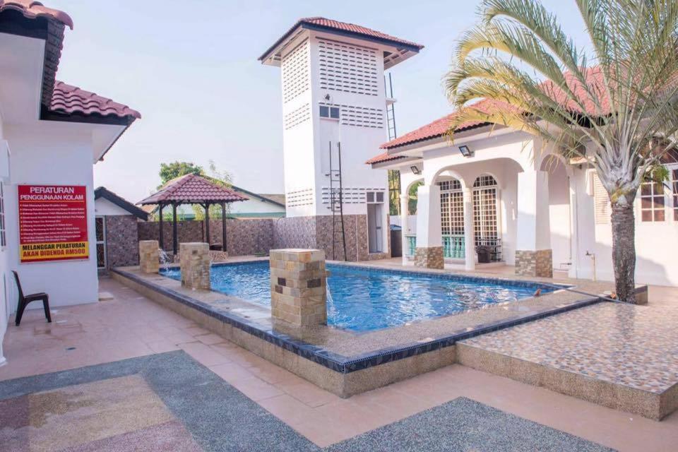 Wan Danisha Villa Inn كوتا بْهارو المظهر الخارجي الصورة
