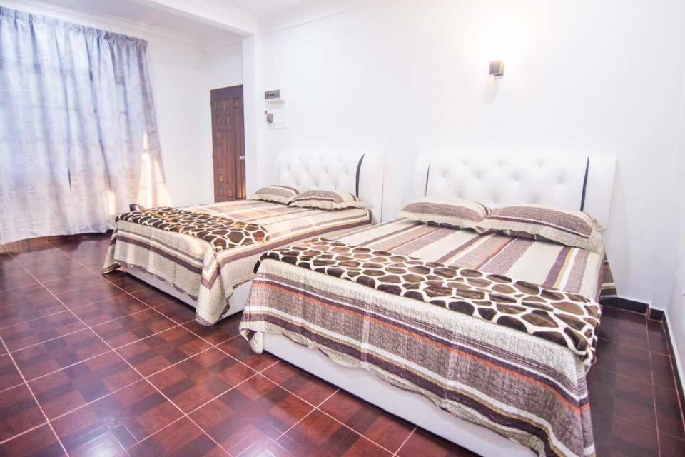 Wan Danisha Villa Inn كوتا بْهارو المظهر الخارجي الصورة